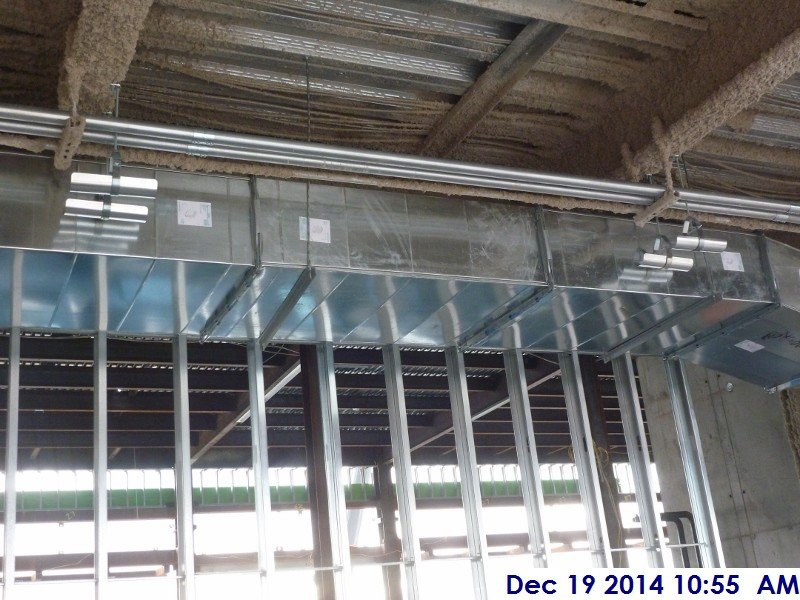 Installing electrical conduit above the ceiling at the 4th floor Facing South